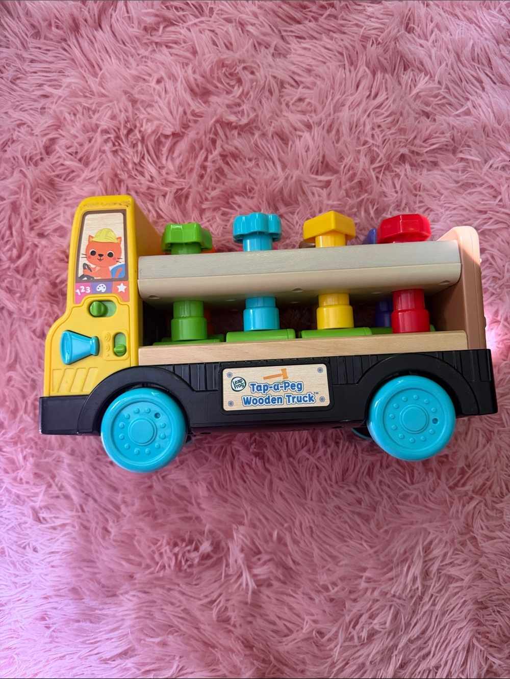 Tap-a-Peg Wooden Truck Toy